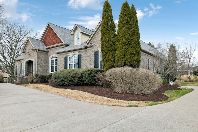 view of front facade featuring brick siding