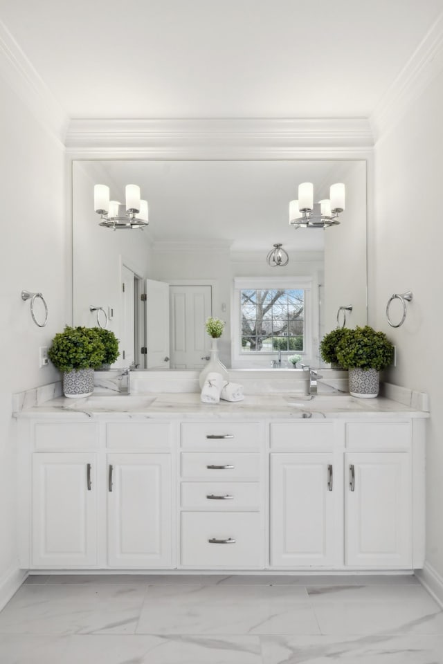 full bathroom with a chandelier, crown molding, a sink, and double vanity