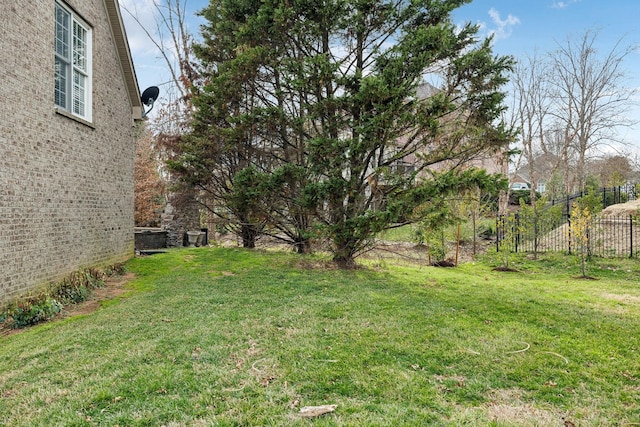 view of yard featuring fence