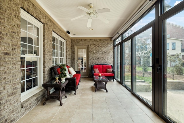 sunroom / solarium with ceiling fan