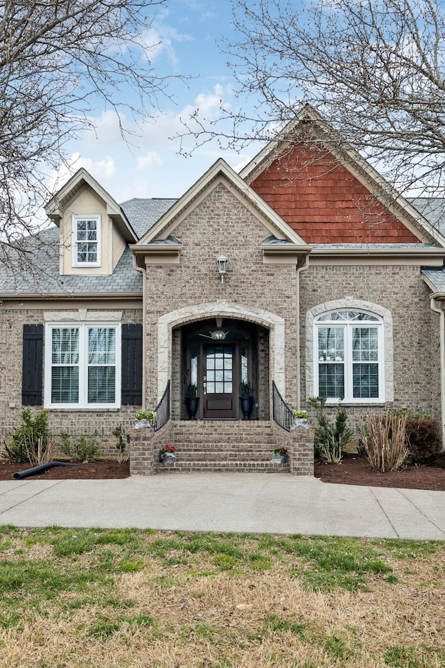 view of front of property with brick siding