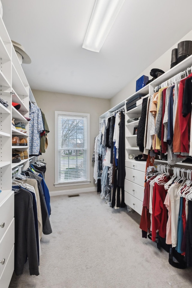 walk in closet with carpet floors and visible vents