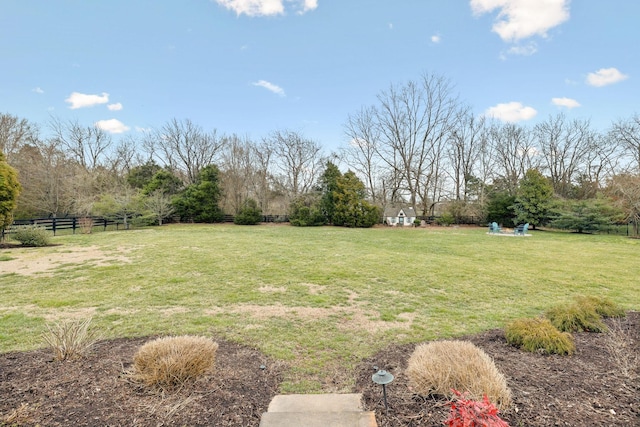 view of yard featuring fence