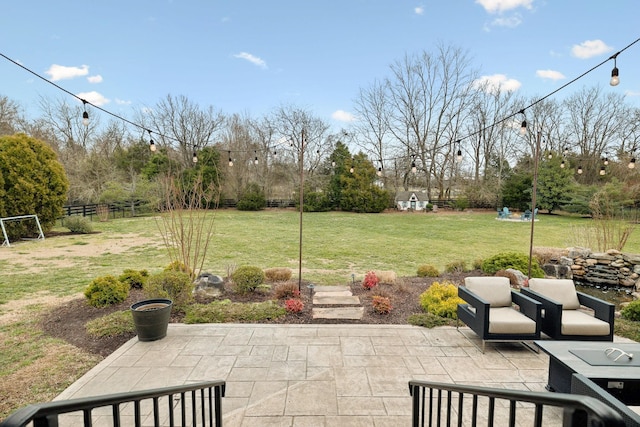 view of patio / terrace featuring fence