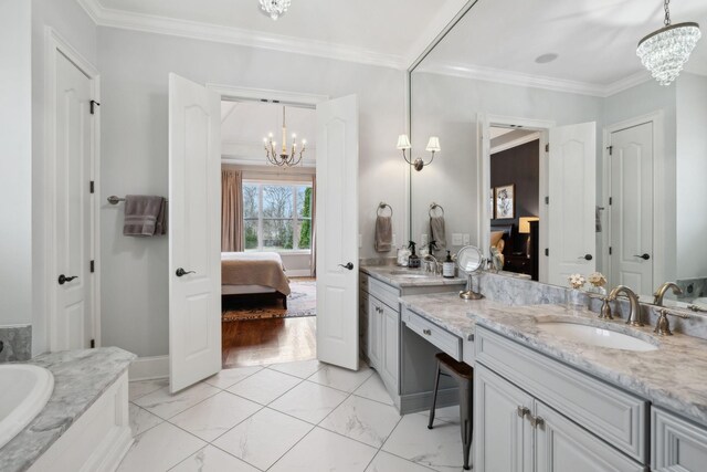 bathroom featuring an inviting chandelier, marble finish floor, crown molding, and ensuite bathroom