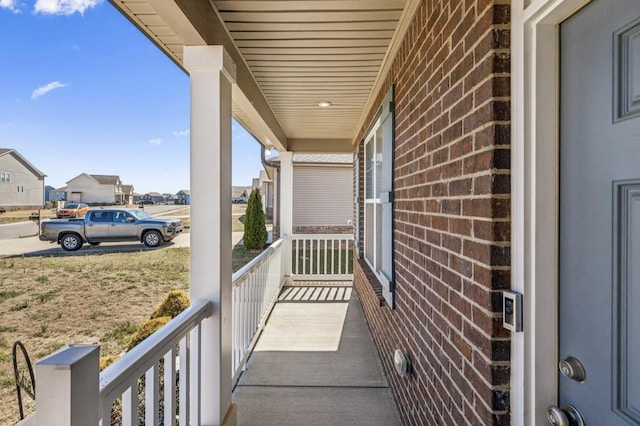 balcony featuring covered porch