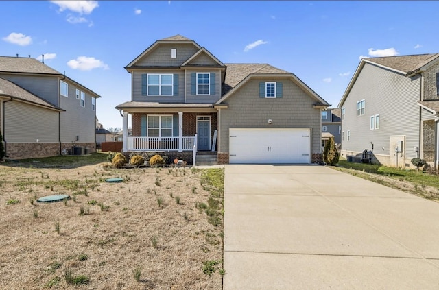 craftsman-style home featuring driveway, covered porch, a garage, central air condition unit, and brick siding