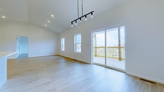 spare room with recessed lighting, baseboards, visible vents, and light wood-type flooring