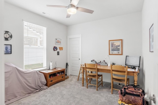 office featuring ceiling fan and carpet flooring