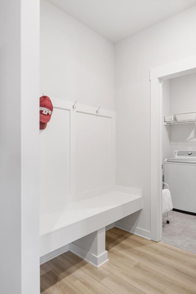 mudroom with washer / dryer and light wood-type flooring