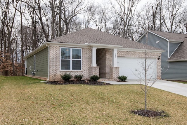 view of front of house with a garage, brick siding, a shingled roof, driveway, and a front yard