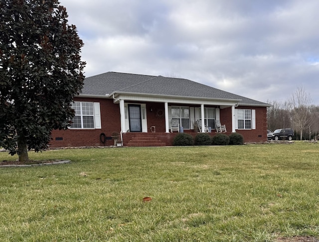 ranch-style house with brick siding, crawl space, and a front yard