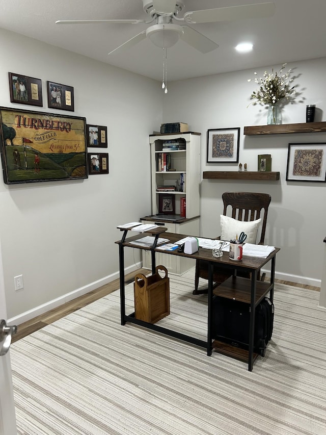 home office with a ceiling fan, recessed lighting, baseboards, and wood finished floors