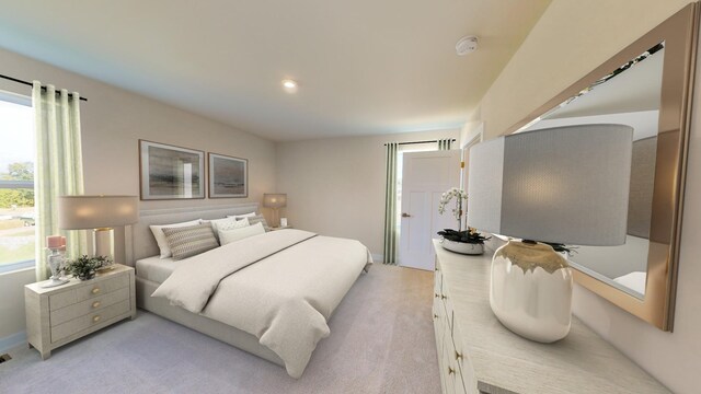 bedroom with light carpet and baseboards