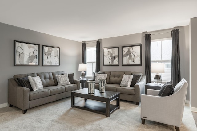 living room with light colored carpet and baseboards