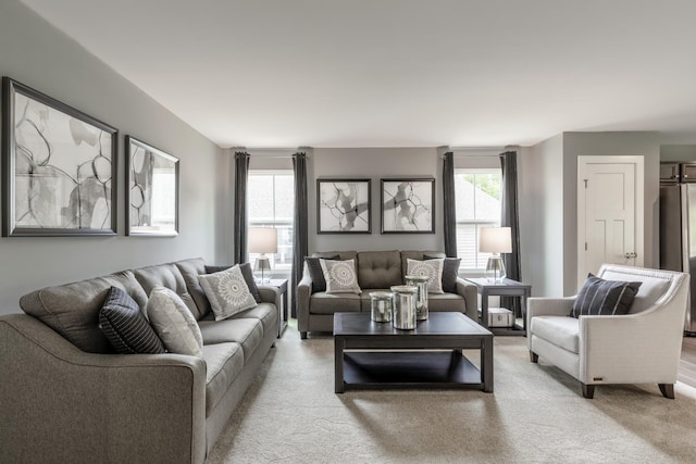 living room with light colored carpet