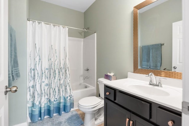 bathroom with shower / bath combination with curtain, vanity, and toilet