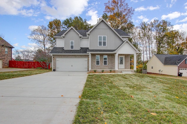 craftsman-style house with a garage, brick siding, fence, driveway, and a front lawn