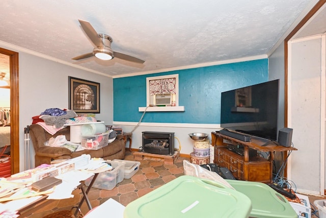 interior space with crown molding, a wood stove, ceiling fan, a textured ceiling, and cooling unit