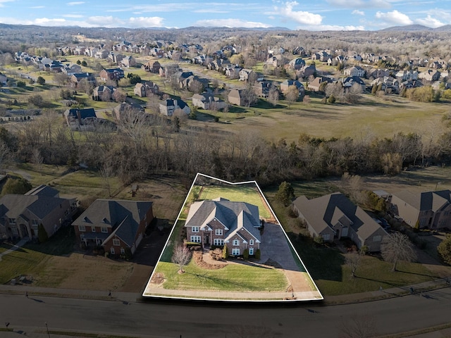 birds eye view of property with a residential view