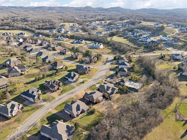 drone / aerial view featuring a mountain view and a residential view