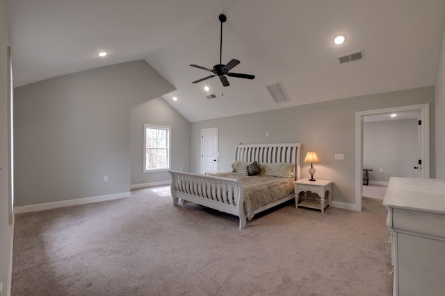 bedroom featuring light carpet, visible vents, and vaulted ceiling