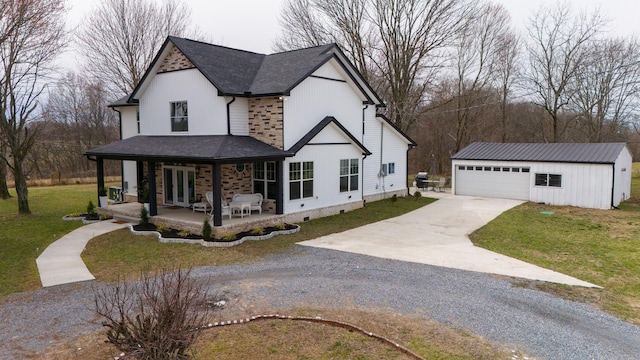 modern inspired farmhouse featuring an outbuilding, covered porch, roof with shingles, crawl space, and a front lawn