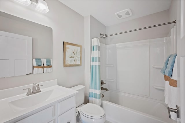 bathroom featuring visible vents, vanity, toilet, and shower / bath combo with shower curtain