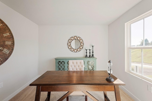 office area featuring carpet floors and baseboards