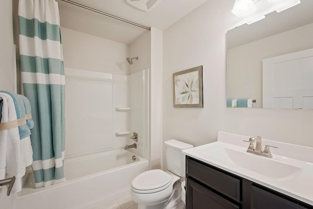 bathroom featuring visible vents, toilet, tile patterned floors, shower / bath combo with shower curtain, and vanity