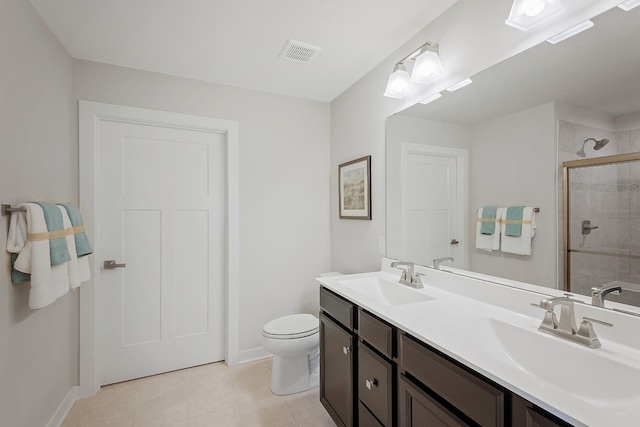 bathroom with visible vents, a sink, a tile shower, and double vanity