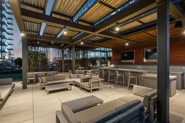 view of patio / terrace featuring outdoor dry bar and an outdoor hangout area