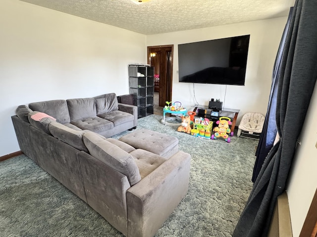 living area featuring a textured ceiling, carpet floors, and baseboards