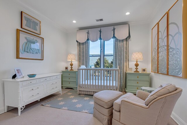 sitting room featuring ornamental molding, recessed lighting, visible vents, and carpet flooring