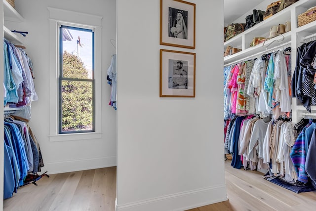 spacious closet with light wood-style floors