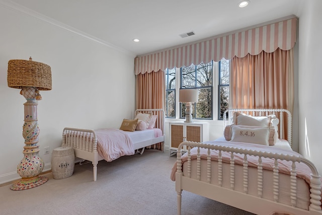 carpeted bedroom with baseboards, visible vents, ornamental molding, and recessed lighting