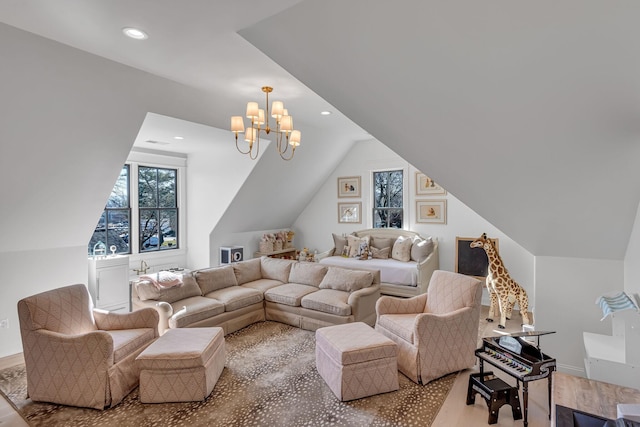 living room with lofted ceiling, recessed lighting, wood finished floors, a chandelier, and baseboards