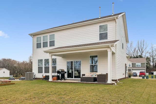 back of property featuring central air condition unit, outdoor lounge area, a patio, and a yard