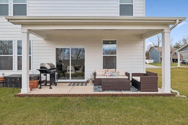 rear view of house featuring a patio area, an outdoor hangout area, and a lawn