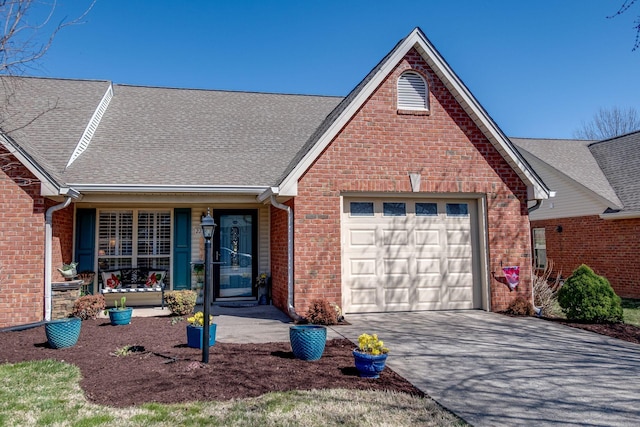 view of front facade featuring an attached garage, brick siding, driveway, and a shingled roof