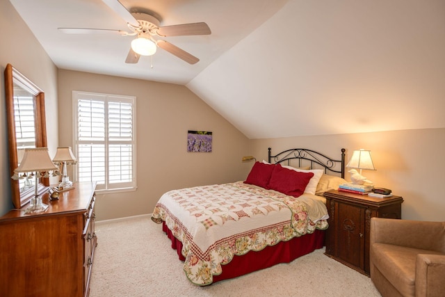 bedroom with baseboards, light carpet, a ceiling fan, and vaulted ceiling