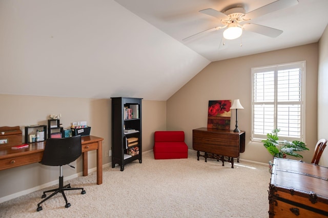 home office featuring vaulted ceiling, a ceiling fan, baseboards, and carpet floors