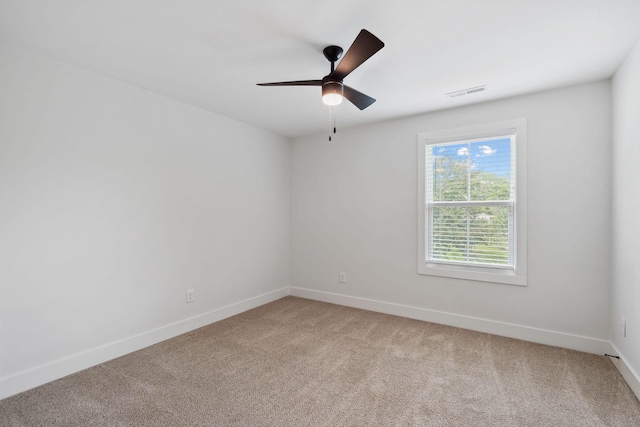 962 Belmont Rd, Clarksville, TN 37040 - empty room with light colored carpet, baseboards, and a ceiling fan