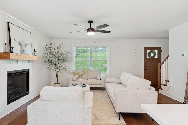 962 Belmont Rd, Clarksville, TN 37040 - living area with healthy amount of natural light, stairway, ceiling fan, and a large fireplace