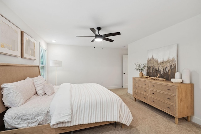 962 Belmont Rd, Clarksville, TN 37040 - bedroom with light carpet, baseboards, and ceiling fan