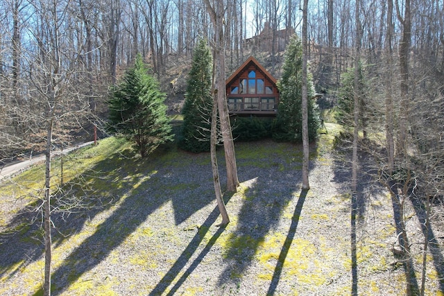 exterior space with a view of trees