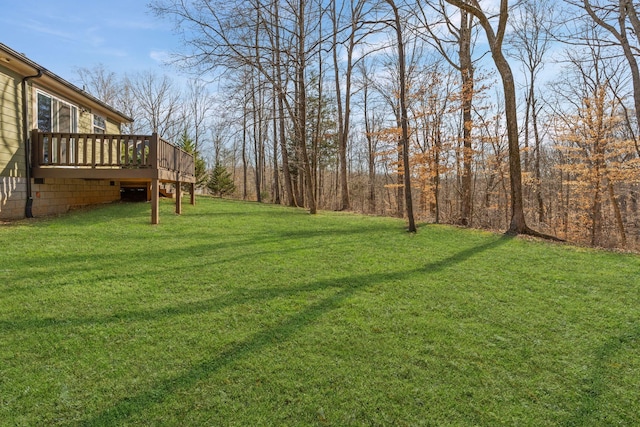 view of yard with a deck