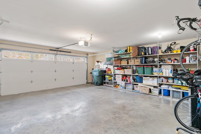 garage featuring a garage door opener