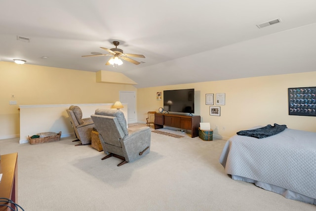 bedroom featuring carpet floors, lofted ceiling, visible vents, ceiling fan, and baseboards