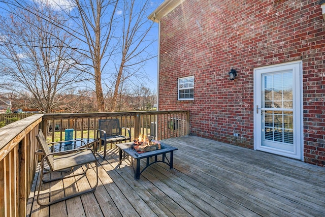 deck with a fire pit